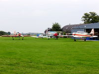 Little Gransden Airfield Airport, St Neots, England United Kingdom (EGMJ) - lots of Yak's. from left to right, RA-02209, G-CCCP, G-BVOK - by chris hall