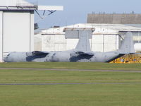 Cambridge Airport, Cambridge, England United Kingdom (EGSC) - Two ex RAF C-130's awaiting their fate at Marshalls of Cambridge - by chris hall