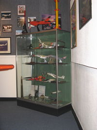 Point Mugu Nas (naval Base Ventura Co) Airport (NTD) - Representative aircraft, targets & missile models in Point Mugu's history. My white Texas Instruments mounted on plaque HARM AGM-88A missile model donation-center top shelf - by Doug Robertson