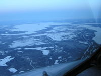 CFB Goose Bay (Goose Bay Airport) - Goose Bay looking East on a cold winter day. - by John J. Boling