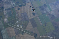 Airglades Airport (2IS) - Skydivers over Clewiston, FL - by Dave G