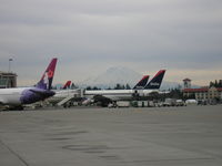 Seattle-tacoma International Airport (SEA) - south end of A-Gates with Mt. Rainier in background - by awhdxer74