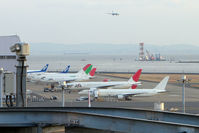 Tokyo International Airport (Haneda), Ota, Tokyo Japan (RJTT) - A view of the southern approach to Tokyo Haneda which first passes the Maintenance Area - by Terry Fletcher