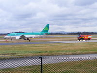 Manchester Airport, Manchester, England United Kingdom (EGCC) - Aer Lingus A320 EI-DVE being followed to the terminal by a fire truck - by Chris Hall