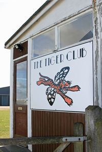 Lashenden/Headcorn Airport, Maidstone, England United Kingdom (EGKH) - Sign on the side of the famous Tiger Club Hut. - by Martin Browne