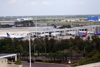 Orlando International Airport (MCO) - Airside 2 with Southwest and Jet Blue planes - by Florida Metal