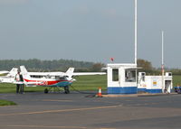 Wycombe Air Park/Booker Airport, High Wycombe, England United Kingdom (EGTB) - CESSNA 152 AT THE PUMPS - by BIKE PILOT