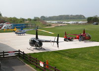 Wycombe Air Park/Booker Airport, High Wycombe, England United Kingdom (EGTB) - THE HELI AIR APRON - by BIKE PILOT