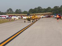 Lakeland Linder Regional Airport (LAL) - Three Champs lining up to depart Sun N Fun 2009. - by Bob Simmermon