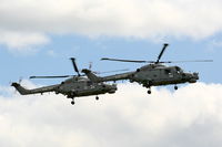 RAF Cosford Airport, Albrighton, England United Kingdom (EGWC) - Royal Navy Lynx display team at the Cosford Air Show - by Chris Hall