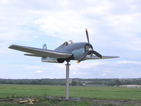 Geneseo Airport (D52) - Replica Hellcat mounted on a pole swiveling with the wind direction. Recently mounted prior to July 11-12th Air Show. - by Terry L. Swann