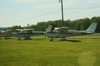 Beach City Airport (2D7) - Three vintage Cessna's at the Father's Day fly-in. - by Megan Simmermon