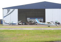 Leeds Bradford International Airport, West Yorkshire, England United Kingdom (EGNM) - GA hangar at Leeds Bradford Airport - by Chris Hall