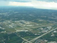 Waukesha County Airport (UES) - Looking SW from 3500' with rain nearby. - by Bob Simmermon