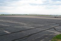 Menomonie Muni-score Field Airport (LUM) - The [huge] bare ramp at Menomonie, WI. - by Kreg Anderson