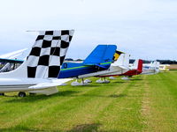 X4SO Airport - line up of tails at the Ince Blundell flyin - by Chris Hall