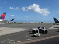 Honolulu International Airport (HNL) - A view of the ramp area between the Central Concourse (right side) and the Diamond Head Concourse (left side). - by Kreg Anderson