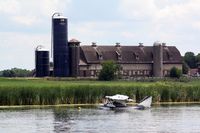 Vette/blust Seaplane Base (96WI) - N25GT moored at Vetts - by Timothy Aanerud