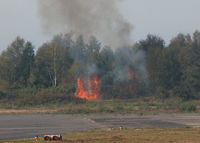 Blackbushe Airport, Camberley, England United Kingdom (EGLK) - BUSH FIRE JUST OUTSIDE THE NORTH EASTERN EDGE OF THE AIRFIELD, UNFORTUNATELY NOT AN UNCOMMON SITE I'VE SEEN FOUR IN THE LAST YEAR SOME ARE BELEIVED TO BE DELIBERATELY STARTED.  - by BIKE PILOT