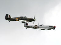 Hawarden Airport, Chester, England United Kingdom (EGNR) - Spitfire and Hurricane of the BBMF displaying at the Airbus families day - by Chris Hall