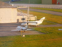 Hawarden Airport - CS-DMM and CS-DRB outside of the Hawker Beechcraft hangar as we arrive back at Hawarden - by Chris Hall