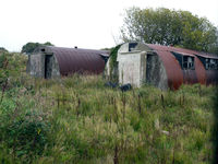 City of Derry Airport, Derry, Northern Ireland United Kingdom (EGAE) - Old nissen huts at the former Royal Navy Air Station Eglinton (North Ireland) - by Joop de Groot