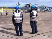 RAF Shawbury Airport, Shawbury, England United Kingdom (EGOS) - Royal Navy Merlin ground crew  - by Chris Hall