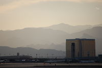 Mc Carran International Airport (LAS) - LAS ATCT with Mandalay Bay in the background. - by AJ Heiser