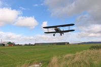 EGNG Airport - Bagby Airfield, North Yorkshire with Kaydet N65200 taking off from 24. - by Malcolm Clarke