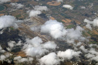 London Heathrow Airport, London, England United Kingdom (EGLL) - Just a glimpse of London Heathrow through the clouds, on a return flight to Newcastle from Jersey in 2009.. - by Malcolm Clarke