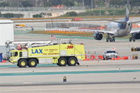 Los Angeles International Airport (LAX) - Los Angeles City Fire Engine 380, on taxiway Charlie KLAX. - by Mark Kalfas