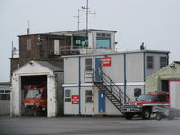 Swansea Airport, Swansea, Wales United Kingdom (EGFH) - 1941 built RAF watch office/control tower, trailer and tractor shed and fire tender shed - by Roger Winser