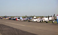 North Weald Airfield Airport, North Weald, England United Kingdom (EGSX) - The line-up of warbirds at North Weald during Air Show Europe in 1992. - by Malcolm Clarke