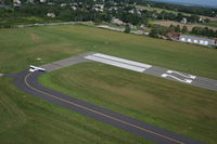 Newport State Airport (UUU) - in a R-44 over Newport RW 22 - by Levi C. Maaia