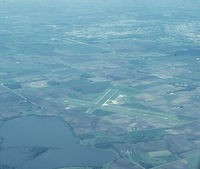 Mankato Regional Airport (MKT) - Looking west toward the airport. Taken from N7680U. - by GatewayN727