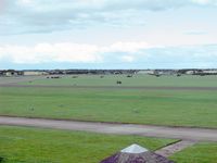 RAF Leeming - View from Leeming's ATC tower looking NE. Two Puma's and 4 Apache's can be seen. - by Malcolm Clarke