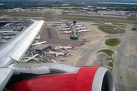 London Heathrow Airport, London, England United Kingdom (EGLL) - Passing Terminal 4 and the new control tower at London Heathrow as seen from Airbus G-DBCG in 2008.  - by Malcolm Clarke