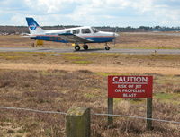 Blackbushe Airport, Camberley, England United Kingdom (EGLK) - PIPER PA-28-161 G-FNPT TAXYING TO RWY 25  - by BIKE PILOT