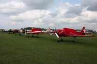 Lakeland Linder Regional Airport (LAL) - Row of Yak's and Nanchang's at Sun N Fun 2010. - by Bob Simmermon