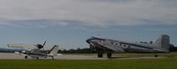 Thomaston-upson County Airport (OPN) - DC-3 and Searay at KOPN fuel ramp. - by J. Michael Travis