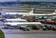 London Heathrow Airport, London, England United Kingdom (EGLL) - A view from the Queens Building at Heathrow Airport including a Yugoslav Airlines DC-9, a Lufthansa Boeing 737, an Iberian McDonnell Douglas DC8, an Aeroflot Ilyushin I-62M, and a BOAC Comet 4.  - by Malcolm Clarke