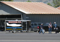 Santa Paula Airport (SZP) - AVIATION F/X trailer in tow between hangars, Experimental aircraft design & fabrication. - by Doug Robertson