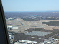 Long Island Mac Arthur Airport (ISP) - Landing at Islip on a clear March morning. - by Paul Beyer