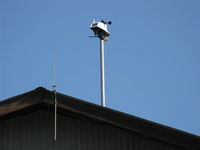 Santa Paula Airport (SZP) - Weather Station multi-sensor/transmitter on hangar-solar powered - by Doug Robertson