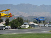 Santa Paula Airport (SZP) - N131MR and N104A in tandem takeoff Rwy 22 at the National Bucker fly-In. (I need a wider angle lens) - by Doug Robertson