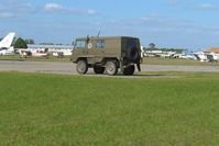 Zephyrhills Municipal Airport (ZPH) - Transient activity and a NATO personnel carrier during Sun N Fun week - by Bob Simmermon