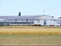 Wellesbourne Mountford Airfield Airport, Wellesbourne, England United Kingdom (EGBW) - one of the original WWII hangars at Wellesbourne which is now part of an industrial estate on the eastern side of the airfield - by Chris Hall