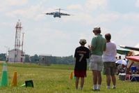 Wittman Regional Airport (OSH) - Watching a C-17A (01-0192) arrive at Airventure 2010 - Oshkosh, Wisconsin - by Bob Simmermon