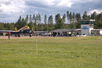 Hultsfred-Vimmerby Airport, Hultsfred / Vimmerby Sweden (ESSF) - Hultsfred airport during its air show on 20 june 2010. At the left is DC-3 9Q-CUK. - by Henk van Capelle