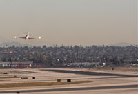 Los Angeles International Airport (LAX) - DC-9 on short final 25L KLAX with a crosswind landing. - by Mark Kalfas